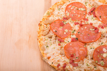 Pepperoni Pizza on Wood Cutting Board with Copy Space