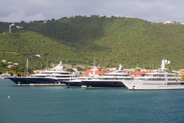 Fototapeta premium Three Blue Yachts and One White