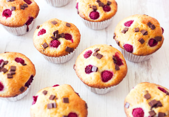 Group of delicious muffins placed on table