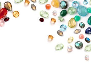 Beautiful real gemstones compostion on white background.