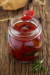 Homemade sun dried tomatoes with thyme, rosemary and basil.