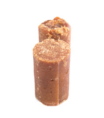 Brown coconut sugar over white background
