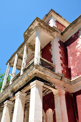 Fototapeta na wymiar old dilapidated building with balconies