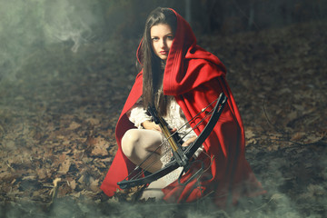 Little red riding hood waiting the prey