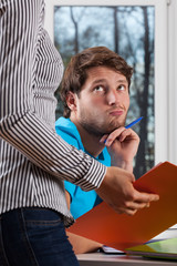 Fototapeta premium Charming student flirting with teacher