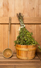 Sauna broom in bucket