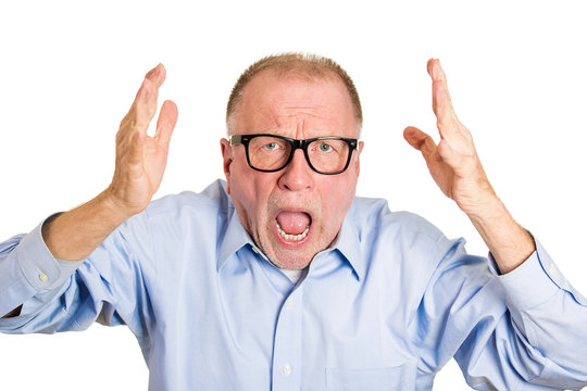 Portrait Angry older man screaming on white background 