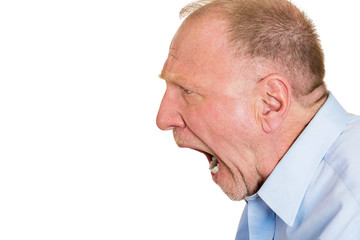 Side view portrait Angry older man isolated on white background 