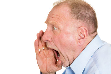 Side view portrait Angry older man isolated on white background 