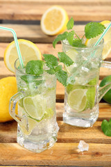 Drink with lime, lemon and ice