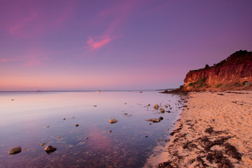 Sunset over sandy beach