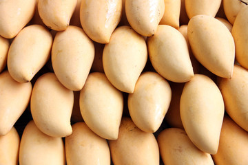 Ripe yellow mangoes in the fruit market.