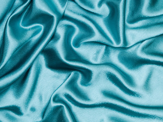 wave background of blue silk texture