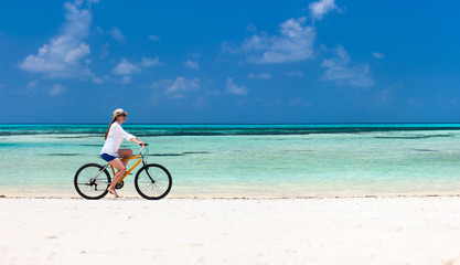 Fototapeta premium Young woman biking