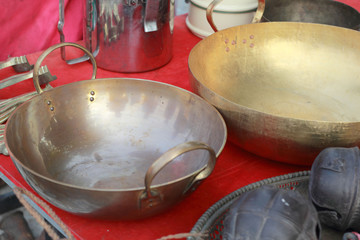 Vintage copper cookware sold in the market