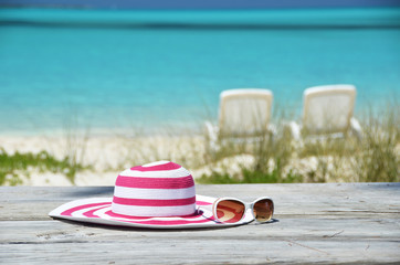 Fototapeta na wymiar Hat and sunglasses. Exuma, Bahamas