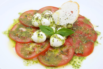 appetizer with tomatoes and cheese in a restaurant