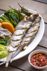 stream fish and vegetable and chili sauce in thailand