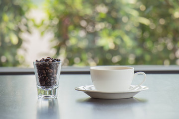 Coffee cup and beans