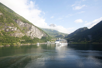 Fototapeta na wymiar Cruise ship in Geirangerfjord Norway
