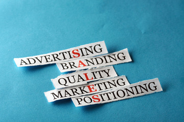 Sales  acronym in business concept, words on cut paper hard ligh