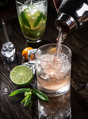 Pouring a cocktail into glass