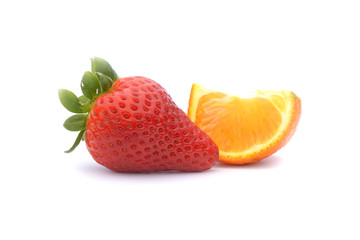Strawberries and tangerine isolated on white background