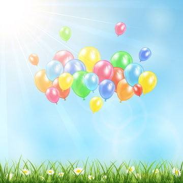 Sunny background with grass and balloons