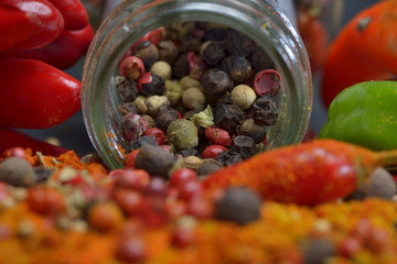 Red hot chili peppers and colors spices composition