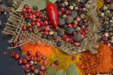 Colors spices composition. Cooking ingredients on a tabletop.