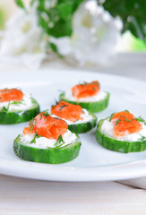Delicious canapes on table close-up