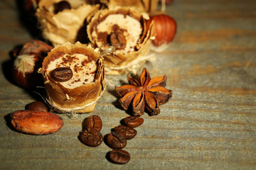 Tasty chocolate candies with coffee beans and nuts