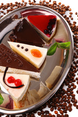Assortment of pieces of cake, close up © Africa Studio