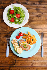 Grilled steak, grilled vegetables and fresh green salad