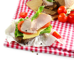 Delicious sandwiches with meet on table close-up