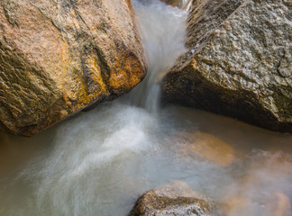 Water and rock  in the river natural motion blur abstract