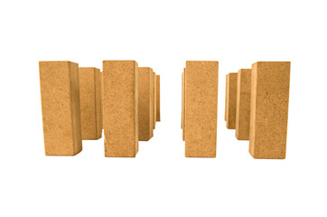 standing jenga pieces on white background
