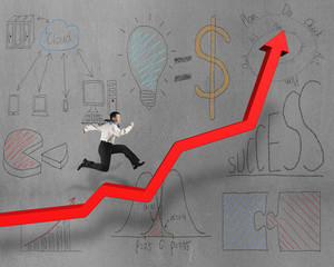 Running on growing red arrow with business doodles