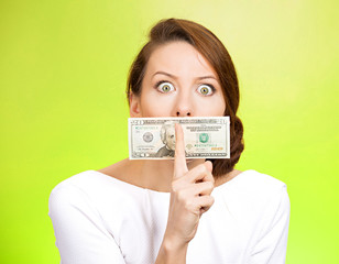 Corruption, woman with dollars and quiet gesture on her mouth 