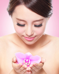 beautiful face with pink orchids