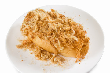 Bread with dried shredded pork isolated on dish