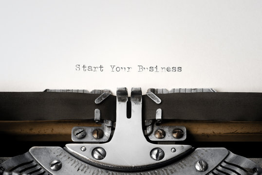 "Start Your Business" written on an old typewriter