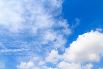 Naklejka na ściany i meble Distribution of white clouds on the clear blue sky for backgroun