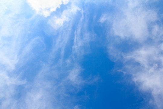 Distribution of white clouds on the clear blue sky for backgroun