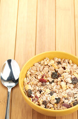 Delicious and healthy cereal in bowl with milk