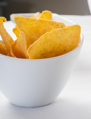 tortilla chips in white bowl