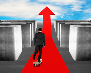 skateboarding on growing arrow through maze with blue sky