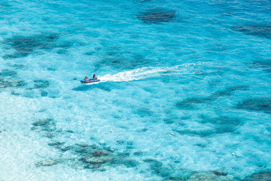 Speed boat in crystal clear tropical sea
