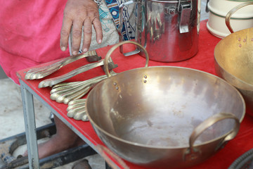 Vintage copper cookware sold in the market