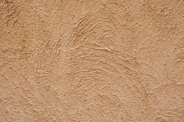 Orange rough plaster on wall